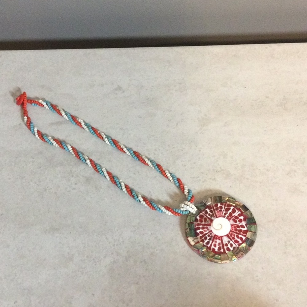 3 strand twisted bead necklace with 2” round abalone shell drop